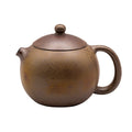 Short-mouth kiln-transformed Xishi yixing clay woodfired teapot with a textured brown finish.
