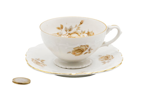 Tasse à thé en porcelaine avec la soucoupe  # 93835