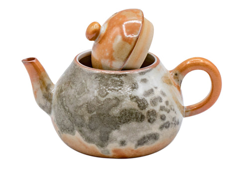 Keramische theepot met aardse tinten en gestructureerde glazuur # 934811