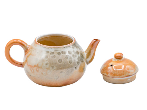 Keramische theepot met aardse tinten en gestructureerde glazuur # 934811