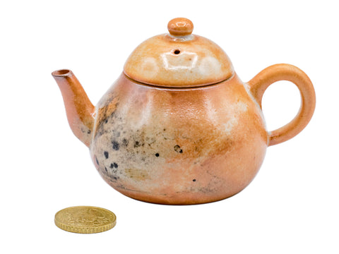 Keramische theepot met aardse tinten en gestructureerde glazuur # 934812