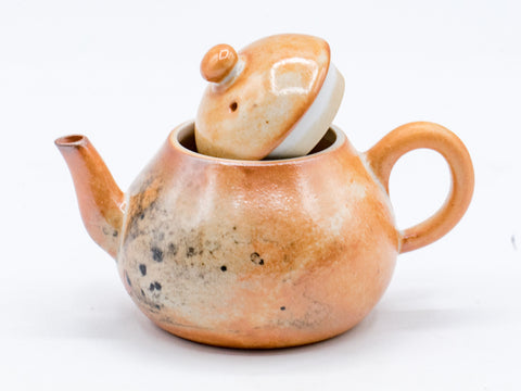 Keramische theepot met aardse tinten en gestructureerde glazuur # 934812