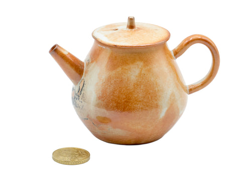 Keramische theepot met aardse tinten en gestructureerde glazuur # 934812