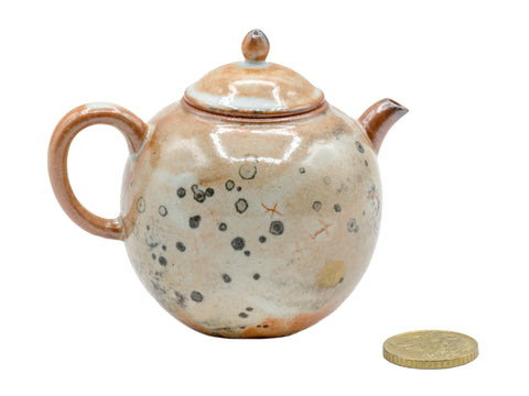 Keramische theepot met aardse tinten en gestructureerde glazuur # 934812