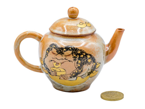 Met de hand beschilderde kalligrafie theepot met aardse tinten # 934793