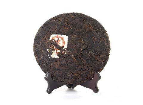 Hong Yin Da Ye Qiaomu Zhong (Sheng Puer from large-leaf trees «Red Seal» 2003), 322 g