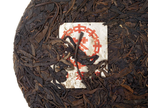 Hong Yin Da Ye Qiaomu Zhong (Sheng Puer von Großblattbäumen „Red Seal“ 2003), 322 g