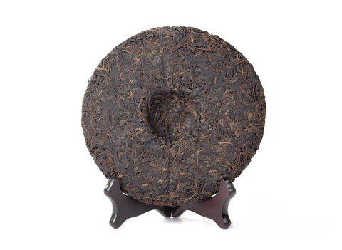 Hong Yin Da Ye Qiaomu Zhong (Sheng Puer von Großblattbäumen „Red Seal“ 2003), 322 g