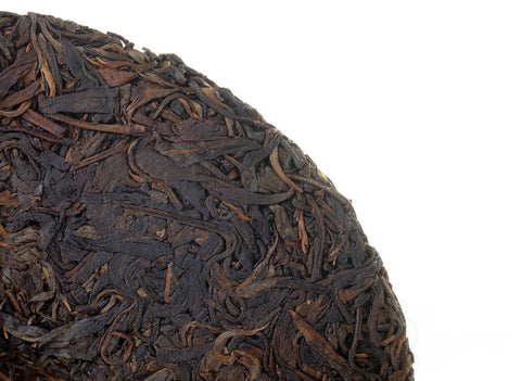 Hong Yin Da Ye Qiaomu Zhong (Sheng Puer von Großblattbäumen „Red Seal“ 2003), 322 g