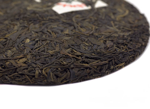 Zhong Cha Pai Meishu Ji Yuan Cha (1999), aged sheng puer, 356 g