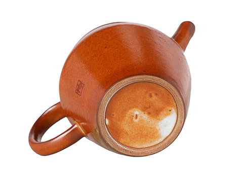 Oranje keramische theepot met kalligrafieontwerp # 94384