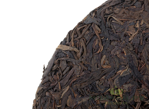 Hong Yin Da Ye Qiaomu Zhong (Sheng Puer van grootbladige bomen «Red Seal» 2003), 322 g